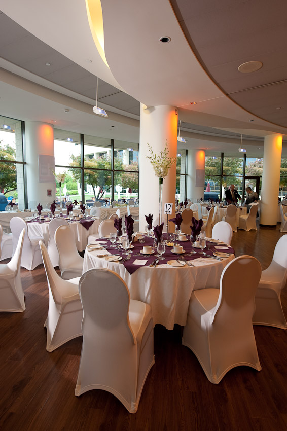 A large room with tables and chairs.